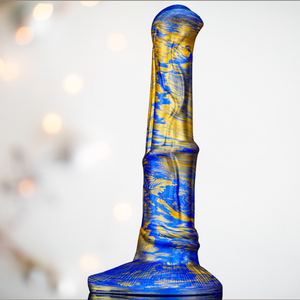 The blue/gold horse dildo from house of chastity, shown is the realistic shape and the base colour, gold variation  that makes for a stunning resulting dildo.