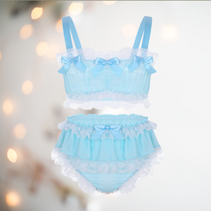 In baby blue, this bra and panties set has bandeau style bra top edged in white lace and colour matching satin bows. The panties are a high waisted design and have matching lace frills and satin bows.