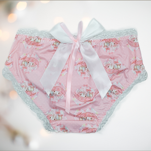 The rear view of our bunny love panties from House of Chastity/ You can see that the cute Japanese bunny pattern runs through out, but there is a large decorative pink satin bow to the rear.