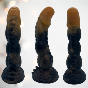 The Tiamat Dragon Spine Dildo from House Of Chastity shown from three different angles.