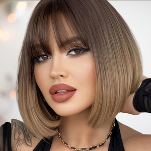 A cute chin length bob in a soft brown falling to blond. The straight lines make this style very fashionable.