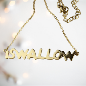 Stainless steel finished in gold, ISWALLOW necklace is spelt out in a joined up style and attached to a matching gold chain.