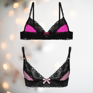 Sized for men to wear, these are a deep pink and pale pink bralette that has deep pink cups with black lace edging to the top of the cup and a band of black lace that runs from front to back at the bottom of the bra. It has two adjustable thin black straps and fastens at the back.