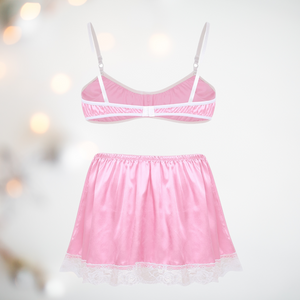 A pretty bra and petticoat set for men, the bra comes in satin baby pink with a lace decoration to the cups, thin white bra straps and a matching satin above knee petticoat with white lace edging detail and matching white satin bow detail.