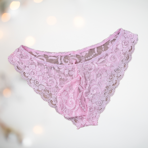 Floral lace panties from House Of Chastity. The knickers are pale pink, and are in a bikini style with penis pouch. 