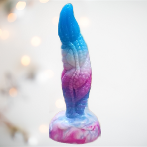 Close up of the Blue Lagoon Monster Dragon Dildo, close up of the tongue style head, dragon scale body and deep sucker base.