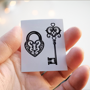 The elaborate heart shaped padlock and key temporary tattoo, you can see that it has been made in a filigree style. 