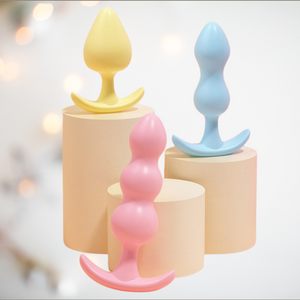 The pastel triple butt plug set from House Of Chastity, the set comes with 3 individual butt plugs in a gorgeous yellow, blue and pink. The 3 different shapes allows for long-term fun.6