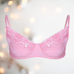 Soft Pink satin bra close up, you can see the soft pink colour, half cup lace and thin adjustable straps.