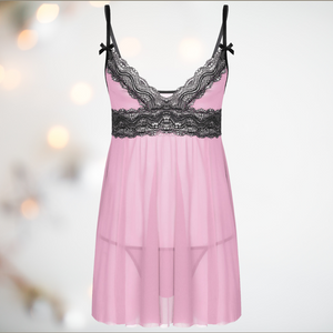 The pink see through night dress and matching thong panties, iyou can see the soft pink colour that is complemented by the black lacing.