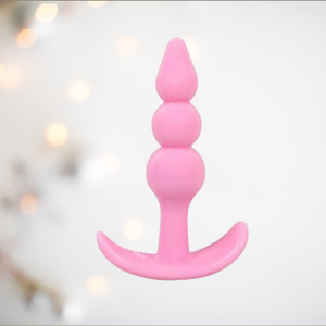 An image of the triple bead pink small anal butt plug from House Of Chastity
