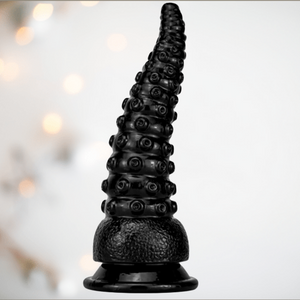 The Octopus dildo from House Of Chastity shown in black.