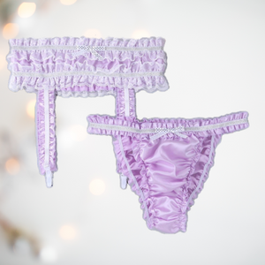 Depicted is the lilac suspender belt and panties set, it shows the deep waist suspender belt with ruched satin, lace edging, satin decorative bow and 4 straps. The matching bikini panties ar shown , you can see that they are pure ruched satin, with matching bow detail. 